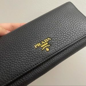 Prada logo-plague continental wallet unisex’s